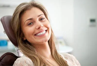 woman smiling during her visit to Broadwing Dental Studio