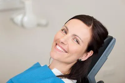woman smiling during her visit to Broadwing Dental Studio