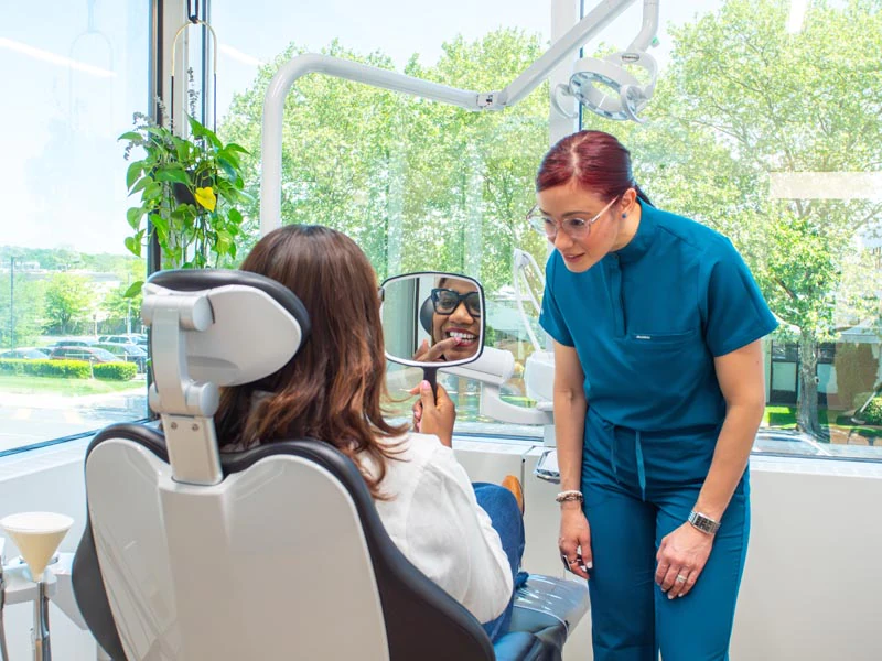 Dr. Eduardo working with an orthodontic patient at Broadwing Dental Studio